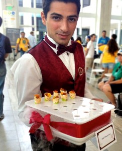 catering waiter presenting appetizers