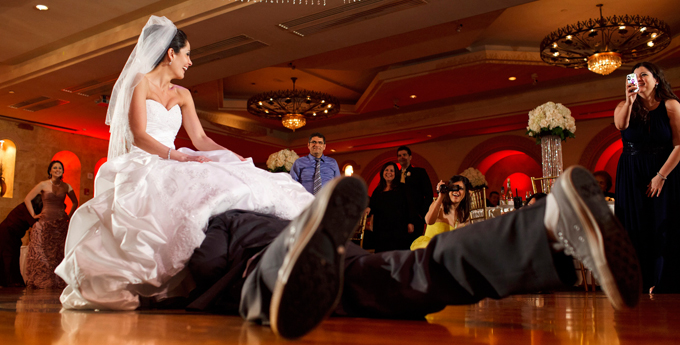 Removing the brides garter.